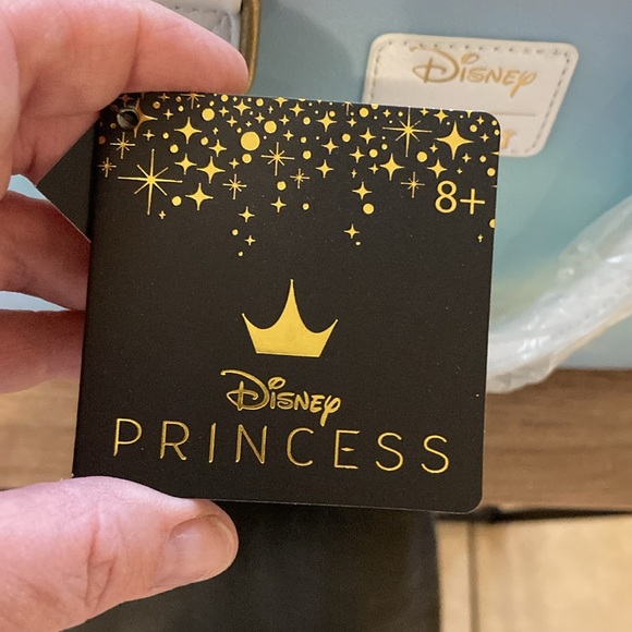 Ariel, sitting under moon satchel, lounge, fly purse - Picture 5 of 11